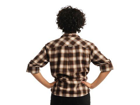 A person with curly hair wearing a brown plaid shirt from the back view