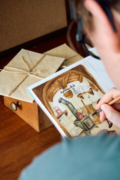 Artist over shoulder view painting cozy room watercolor art