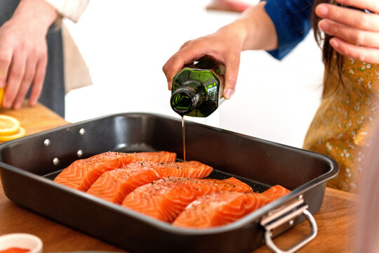 Salmon preparation with olive oil.