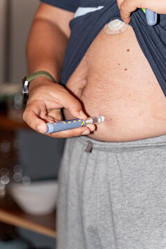 Patient self-administering insulin with medical device
