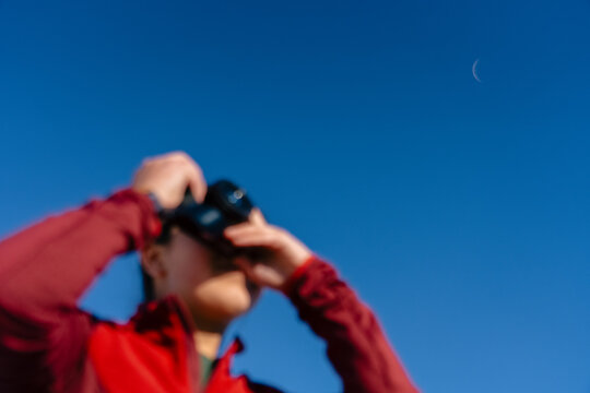 Taking Pictures Against A Deep Blue Sky