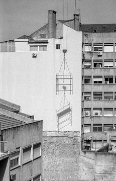 Scaffolding Lifted Above Lisbon