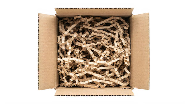 Open cardboard shipping box filled with brown paper filler shreds for safe product packaging