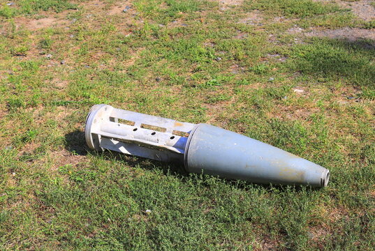 War in Ukraine. Wreckage of Russian missile on grass in Dnipro, Ukraine. Remains of an exploded military ballistic or cruise rocket.