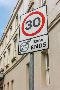 30mph speed limit sign with 20mph zone ends panel, low angle