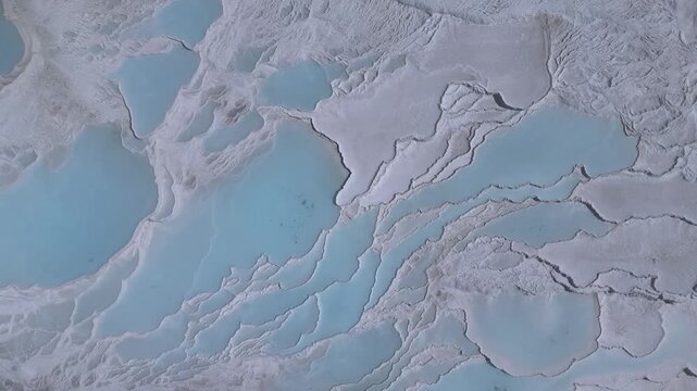 Aerial view of breathtaking natural site of white travertine thermal terraces, Pamukkale, T&uuml;rkiye	
