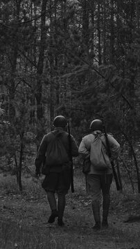 Red Army soldiers walking through the woods in World War II