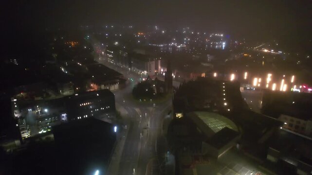 Aerial Night Footage of Illuminated Central Plymouth City Drone Tour over Main Street Buildings of England United Kingdom. June 28th, 2025