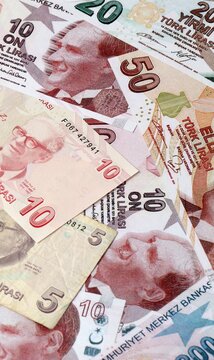 Turkish lira money bills in pile on table. Turkey TRY currency cash close up