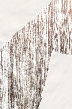 Wooden background with torn paper sheets. Rustic style backdrop for cozy design projects
