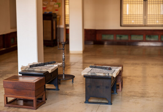 View of traditional wooden furniture and ancient books displayed inside a room at Gyeongbokgung Palace in Seoul, Seoul, South Korea.