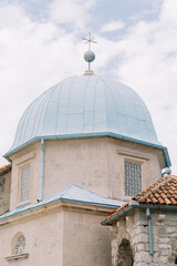 Dome and architecture of Our Lady of the Rocks church in Perast Montenegro © VolodymyrNadtochii