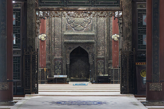 View of the intricate wood carvings and ornate prayer hall interior at the Great Mosque of Xi'an, Xi'an, Shaanxi, China.