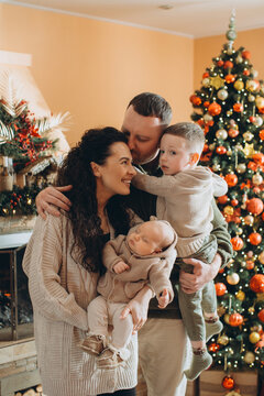 Happy family celebrating christmas holidays at home