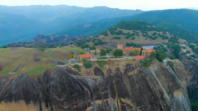 Meteora, Kalabaka, Greece. Monastery of the Transfiguration of the Saviour. Meteora - rocks, up to 600 meters high. There are 6 active Greek Orthodox monasteries listed on the UNESCO list. Drone foot