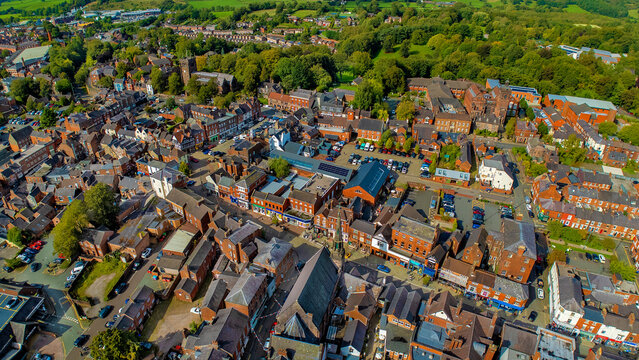 Aerial view of heritage town district and central street layout