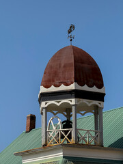 Fototapeta premium A bell tower on a historic church in Philipsburg, Montana