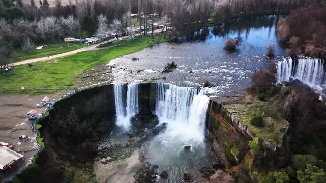 Aerial Drone View of Waterfall and rapids in the lush green forest at Saltos del Laja, Chile 