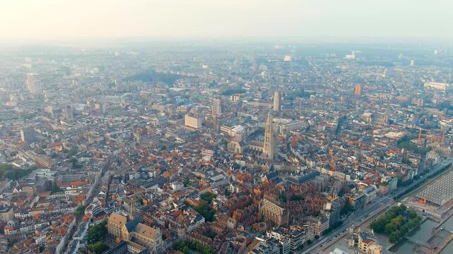 Antwerp, Belgium. Panorama overlooking the Cathedral of Our Lady (Antwerp). Historical center of Antwerp. City is located on the river Scheldt (Escaut). Summer morning. Drone footage