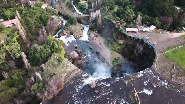 Aerial Drone View of Waterfall and rapids in the lush green forest at Saltos del Laja, Chile 