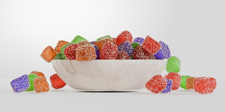 3d sugary gummy candies in a bowl, white background