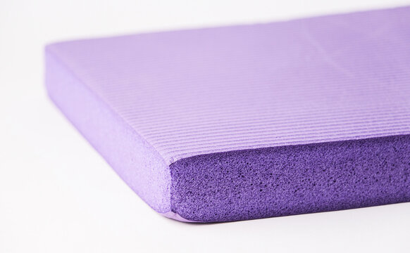 purple yoga mat with foam texture, porous structure detail