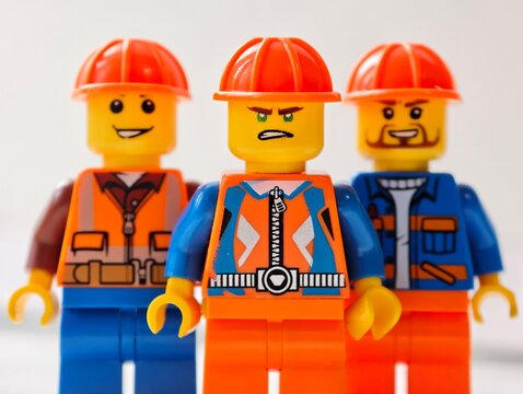 Russia, St. Petersburg, August 8, 2020 A group of Lego construction workers wearing construction gear, perfect for illustrations, presentations, or marketing materials