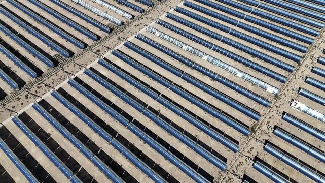 aerial view of solar thermal power station with parabolic trough collectors