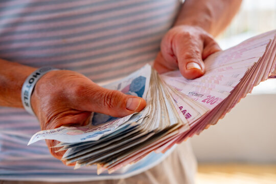 Male hands counting Turkish lira banknotes, economy, money payment, business deal, savings Turkish lira bills, financial background, economy and trade, savings concept, cash flow, real life moment