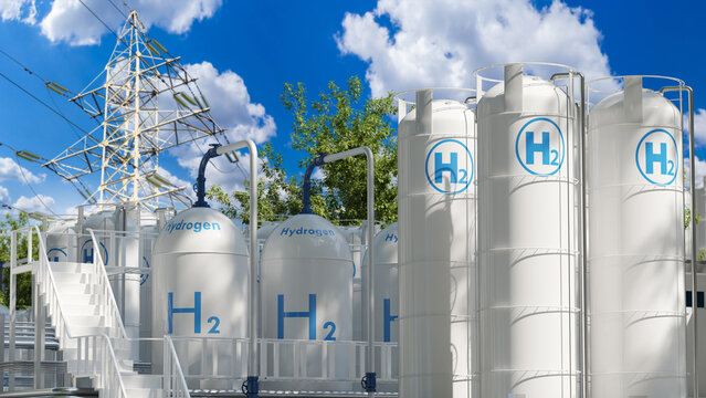 Hydrogen production. Industrial hydrogen storage tanks stand beside high voltage power lines, supporting clean energy generation, grid integration and sustainable fuel supply.