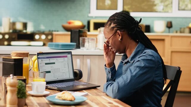 African american client checking dispatch via tracking number