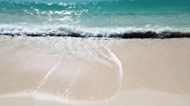 Gentle Tropical Ocean Waves Washing Ashore on Sandy Beach
