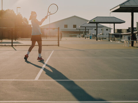 junior tennis player on tennis court