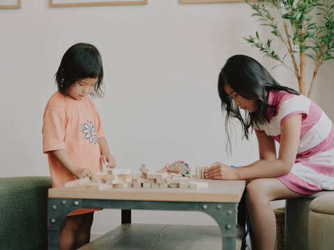 two girls playing boardgame