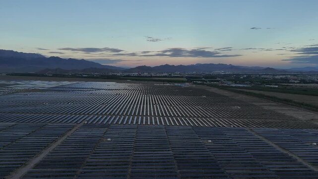 solar photovoltaic panel array at dusk