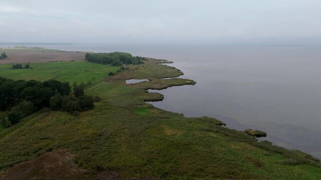 Green Coastal Meadow and Shallow Lagoon on Ruegen Aerial View