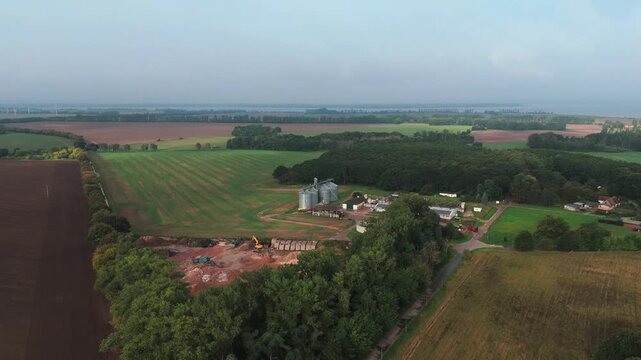 Farmstead With Silos and Harvested Fields on Ruegen Drone View