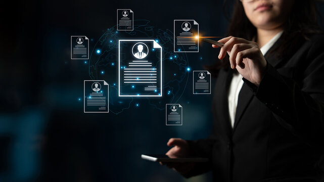 Concept of global talent acquisition and hiring. Human resources department reviewing candidate curriculum vitae and resumes for a job search and workforce selection process. Fermion