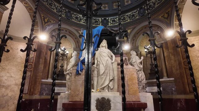 View of the sarcophagus and allegorical statues in the mausoleum of General Jose de San Martin inside the Metropolitan Cathedral of Buenos Aires. k