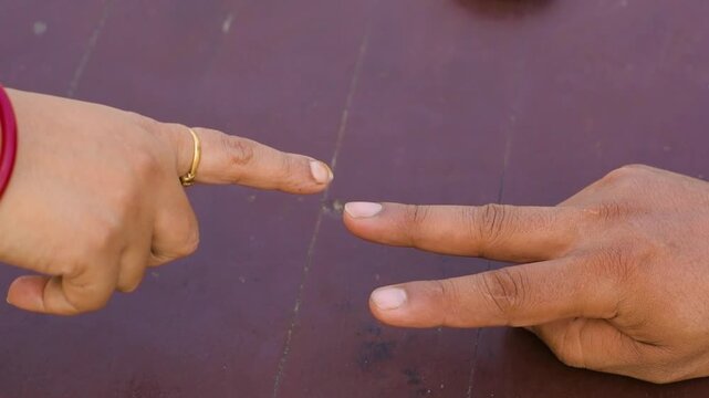 Choosing Between Two Options With Fingers to Make a Decision