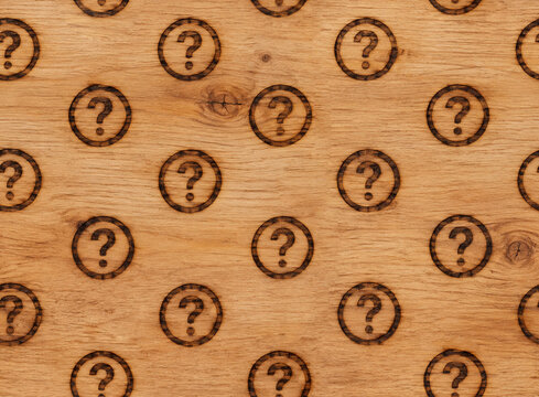 Realistic seamless wood panel texture featuring dark question marks burned with a branding iron, natural grain, rustic surface, warm tones, and repeating pattern.