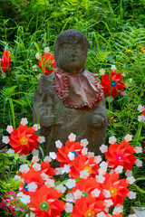 Fototapeta premium Windmills and Jizo statues in japan