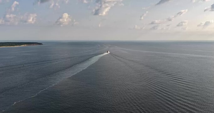 New Shoreham, RI USA - August 12, 2026 - Morning aerial video, hyperlapse, of Block Island's Ferry, on a sunny summer day, 4096 x 2160, Frame rate 25.00 fps.
