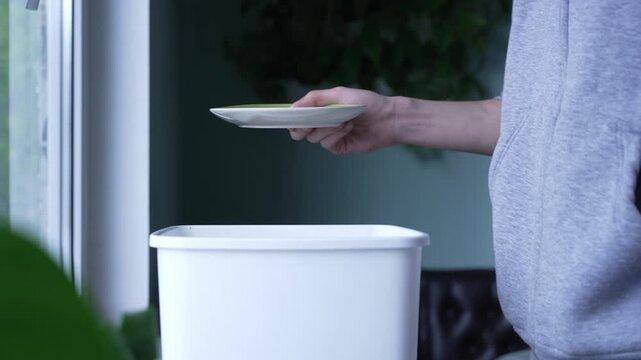 Healthy lifestyle: rejecting cake and sugar. Giving up sweets: throwing away leftover dessert