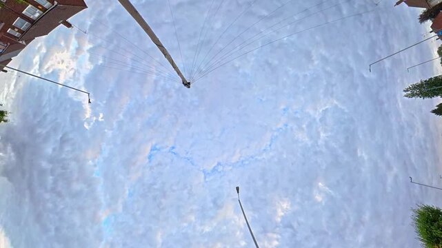 Time Lapse Footage of Sky and Dramatic Clouds over England During Car Drive. Car Roof Mounted Footage with Straight Up Position
