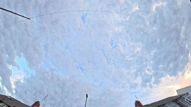 Time Lapse Footage of Sky and Dramatic Clouds over England During Car Drive. Car Roof Mounted Footage with Straight Up Position