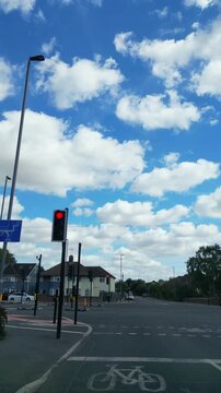 September 4th, 2026. Urban City Streets View of Luton Town of England United Kingdom During Mostly Cloudy Evening. Wide Angle Car Mounted Camera Time Lapse Footage Was Captured During Day Drive. 