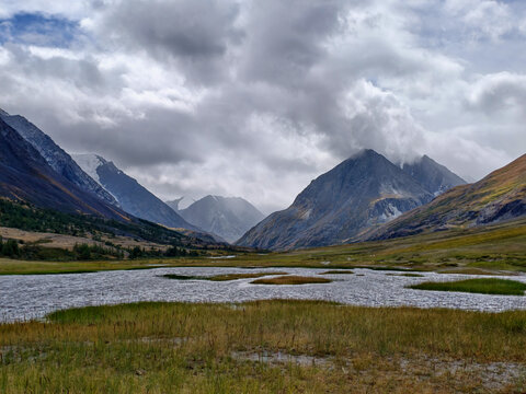 Photo of Altai Lake Akkul. View towards the Sofiysky Glacier on the South Chuya Ridge.