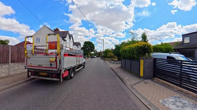 September 4th, 2026. Urban City Streets View of Luton Town of England United Kingdom During Mostly Cloudy Evening. Wide Angle Car Mounted Camera Time Lapse Footage Was Captured During Day Drive. 