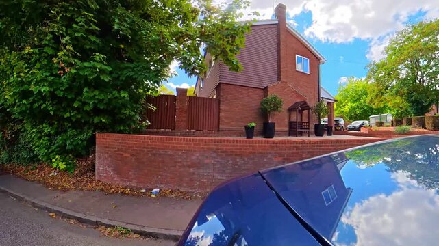 September 4th, 2026. Urban City Streets View of Luton Town of England United Kingdom During Mostly Cloudy Evening. Wide Angle Car Mounted Camera Time Lapse Footage Was Captured During Day Drive. 